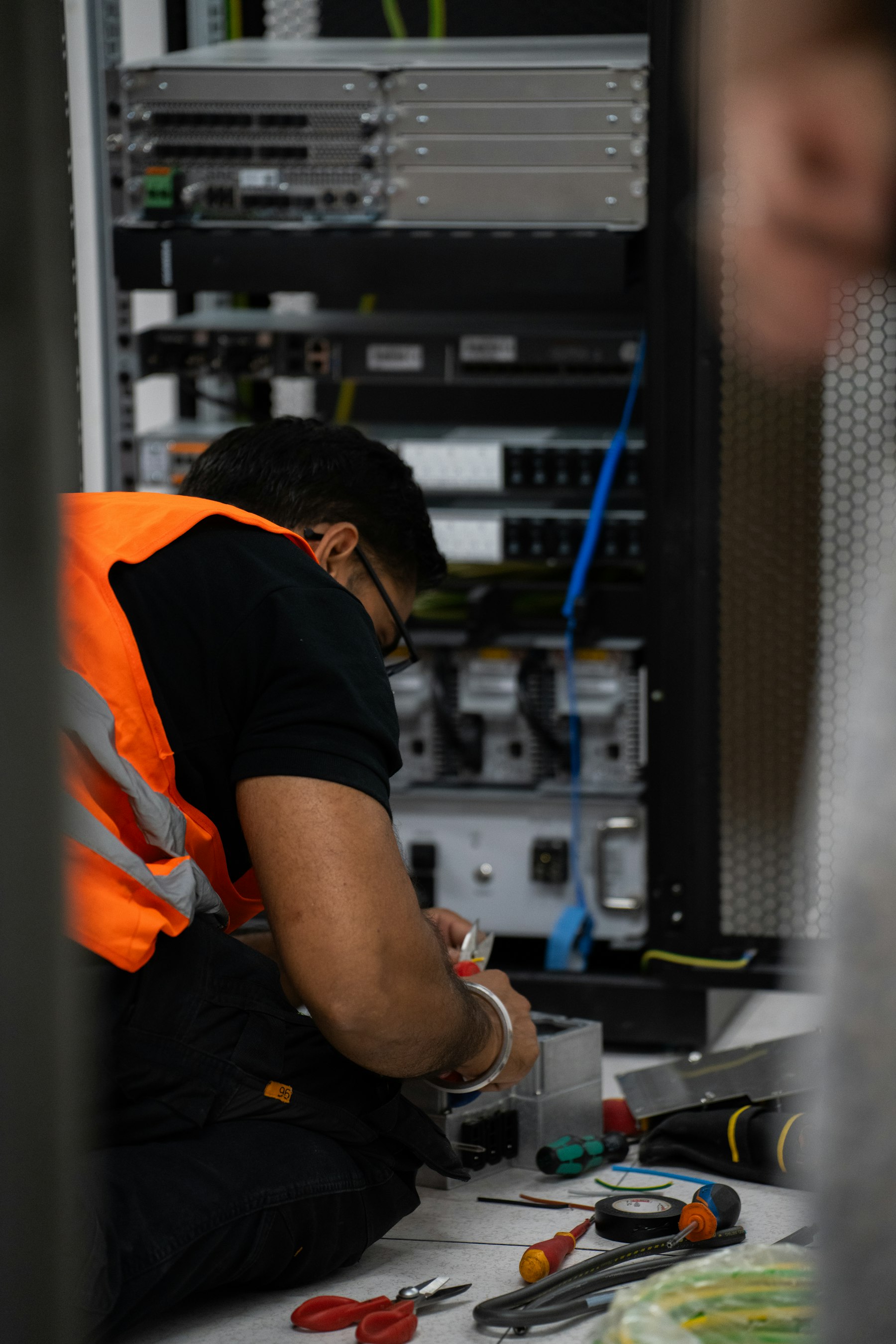 Engineer working on server hardware